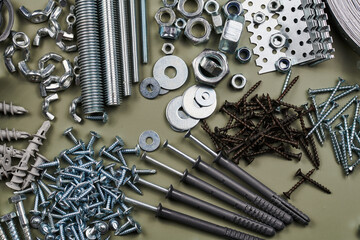 Wall Mural - Set of bolts nuts nails metal fasteners. Consumable hardware tools. assortment steel screws collection close up background