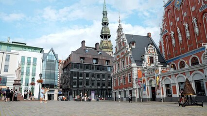 Wall Mural - Beautiful summer day in Riga. People and tourists exploring old town of Riga, Latvia.