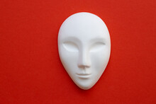 Ceramic White Mask On Red Background