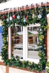 Wall Mural - christmas window decor. street, winter, icicles. christmas tree decoration on the street, decorated 