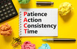 PACT patience action consistency time symbol. Concept words PACT patience action consistency time on white note, yellow background. Business PACT patience action consistency time concept. Copy space.