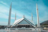 Fototapeta Sawanna - A beautiful view of faisal masjid with birds. unique picture of shah faisal mosque.