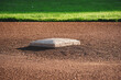 Second base bag on baseball field