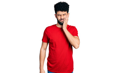 Wall Mural - Young arab man with beard wearing casual red t shirt touching mouth with hand with painful expression because of toothache or dental illness on teeth. dentist