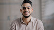 © Yuliia - Happy joyful guy hispanic arabian handsome young man casual model with toothy smile look at camera optimistic male face portrait smiling businessman intelligent millennial posing indoors close up view