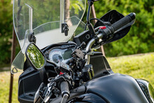 Close-up Of A Black Suzuki Motorcycle Handlebar 
