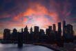 Colorful clouds above the buildings of the New York City skyline at night
