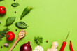 Leinwandbild Motiv Different ingredients for cooking on green background