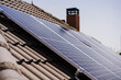 © Westend61 - Solar panels on house rooftop