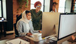 © Jacob Lund - Two Muslim businesswomen working together in a coworking office