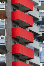 Germany, North Rhine-Westphalia, Cologne, Row of red painted apartment balconies