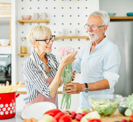 love kitchen senior woman man couple retirement happy bouquet valentines day husband wife flower