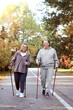 © gpointstudio - Senior caucasian couple hiking together at the park
