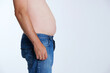 © diegorayaces - anonymous man with a swollen belly. Slimming diet