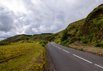 Wall Mural - Empty curvy road in the way to Sete Cidades Lake 