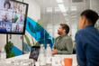 © ReeldealHD images - Businesspeople having a video conference in an office
