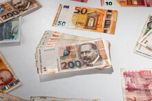 Euro And Croatian Kuna Banknotes On White Background