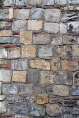 Canvas Print - Full frame texture background of an old medieval European gray color European stone wall