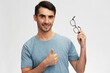 © SHOTPRIME STUDIO - man hand gesture t-shirt glasses lifestyle isolated background
