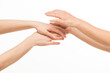 © serhii - female hands do massage, touch each other, stroke each other on a white background isolated