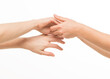 © serhii - female hands do massage, touch each other, stroke each other on a white background isolated