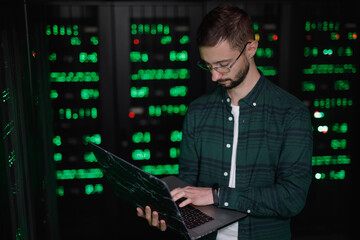 Systems analyst checking connection on device 