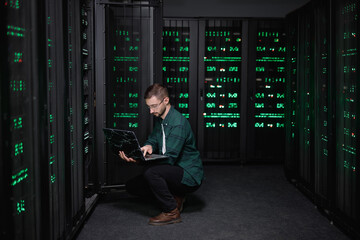 Busy technician making diagnostic of computer software 