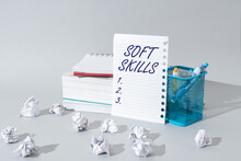 Text Sign Showing Soft Skills. Business Showcase Personal Attribute Enable Interact Effectively With Other Showing Important Idea Shown On Note On Desk With Cup With Pencils And Paperwraps.
