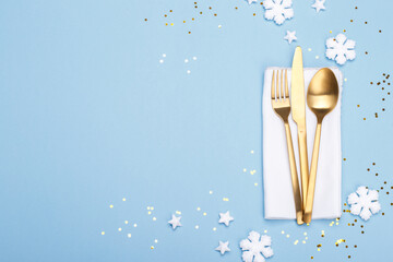 Wall Mural - Christmas or new year table setting with golden cutlery
