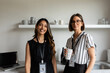 © Valentina Barreto/Stocksy - Female coworkers in office kitchen