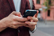 © Studio Firma/Stocksy - Man Using Mobile Phone