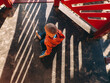 © Natalia Mishina/Stocksy - A child is playing on a playground with sand.