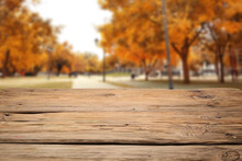 Empty Wooden Table In Beautiful Autumn City Park