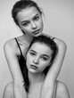 © Stas Pylypets/Stocksy - Portrait of young beautiful model sisters