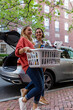 © Raymond Forbes LLC/Stocksy - Mother and Daughter carries gear Moving in to college dorm room