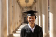© Raymond Forbes LLC/Stocksy - Medium Portrait of Young black college graduate with mortarboard