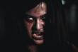© sorapop - Horror bloodthirsty woman ghost or zombie she is horror scary with open mouth at dark night, Screaming zombie female face with blood, Happy halloween day festival concept