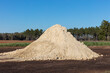 © Rialto Images/Stocksy - Stock photo of pile of sawdust in rural Georgia