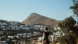 © Lucia Postike/Stocksy - Woman admiring a beautiful mountain view