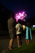© Lauren Lee/Stocksy - Watching fireworks
