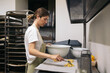 © Pedro Merino/Stocksy - Pastry chef making homemade cookies