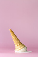Dropped Ice Cream Cone On A Pink Background