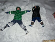 © Jelena Jojic Tomic/Stocksy - The joy on snow, kids making snow angels