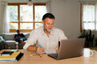 © Nuria Seguí/Stocksy - Man Working In Home Office