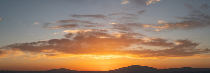 Wall Mural - panorama of a dramatic evening sky