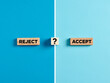 © Cagkan - The words reject and accept on wooden blocks with question mark symbol.
