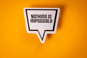 Wall Mural - Nothing Is Impossible. Speech bubble with text on yellow background