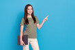 Leinwandbild Motiv Photo of nice millennial brunette lady hold laptop indicate empty space wear striped t-shirt isolated on blue color background