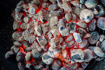 Sticker - Empty grill with red-hot briquettes, close-up.