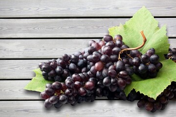 Canvas Print - Raw tasty sweet muscat grapes on background